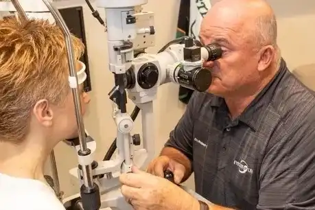 Cedar Valley eye exam with an optometrist and patient